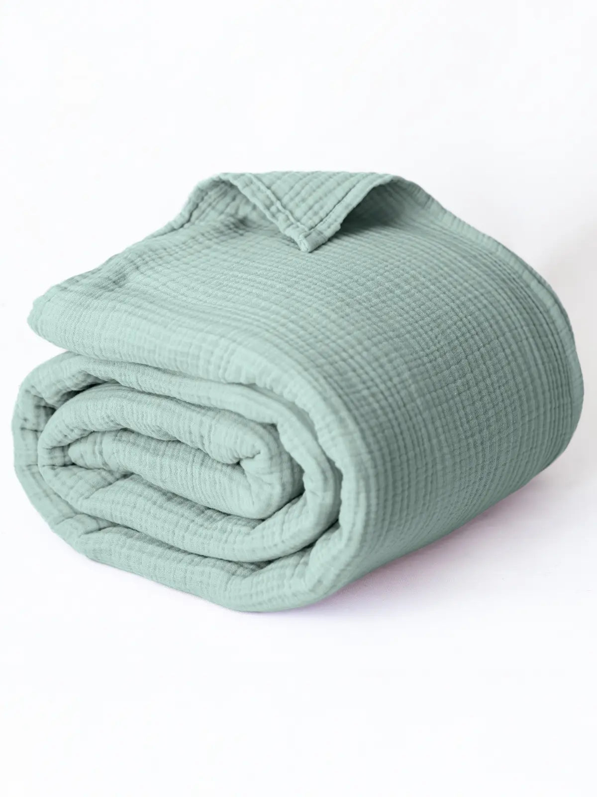 Mint yeşili muslin saçaksız pike katlanmış halde düz kenar detayı