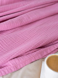 Pembe muslin saçaksız yatak örtüsü temiz kesim kenar işçiliği