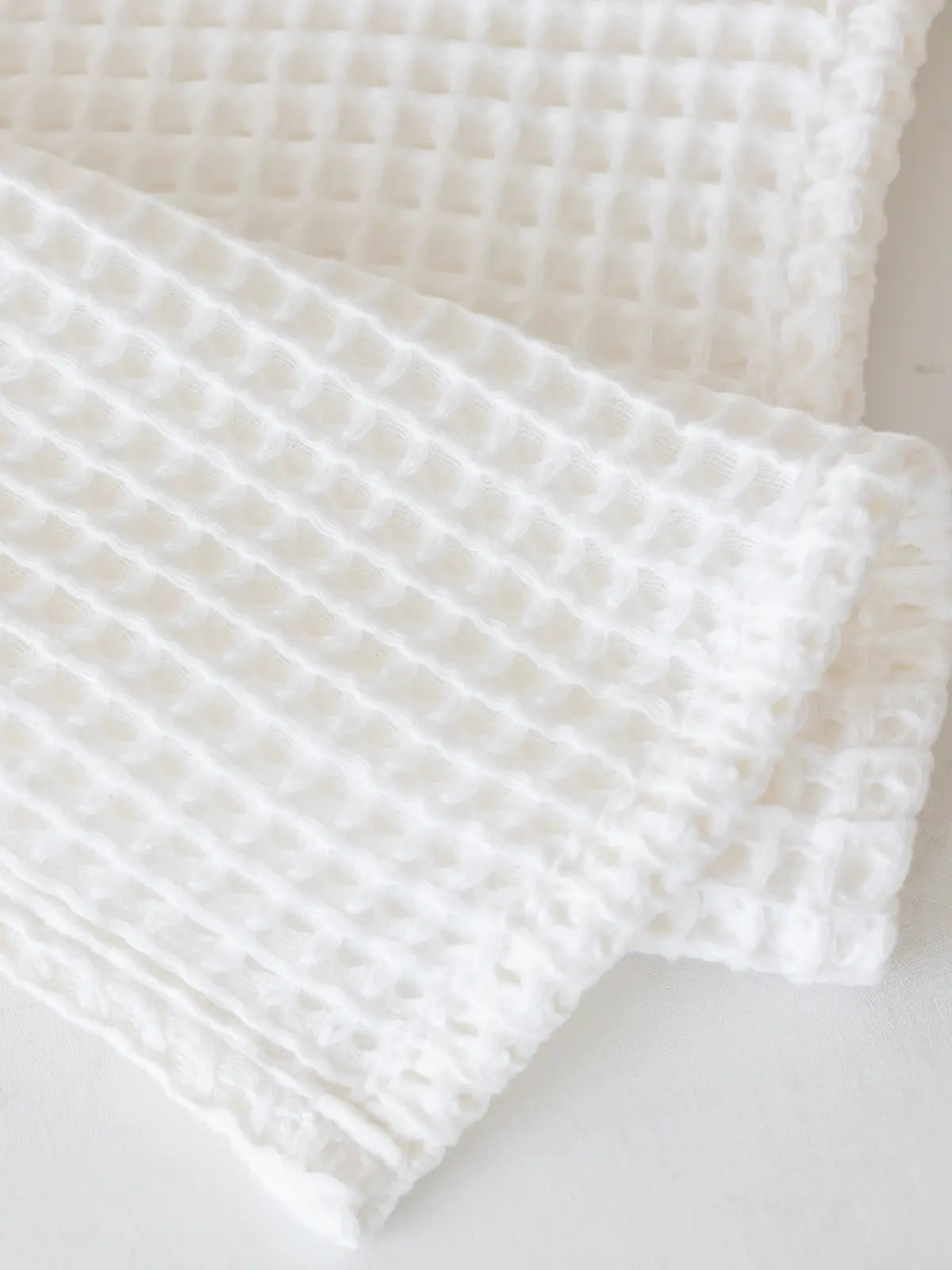Beyaz waffle havlu temiz dokuma yapısı emicilik detayı