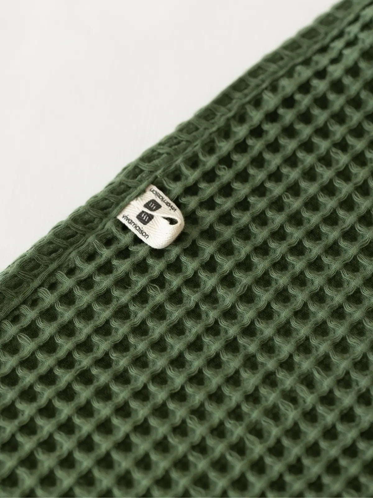 Koyu yeşil waffle havlu dokuma yapısı emicilik