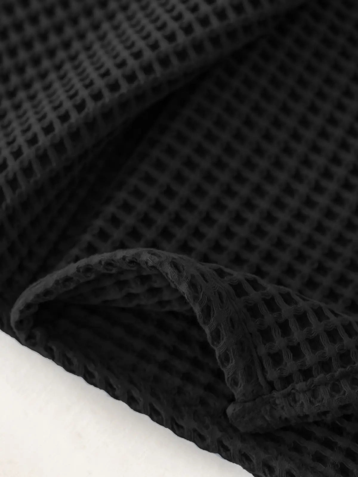 Siyah waffle havlu dokuma yapısı su emme özelliği